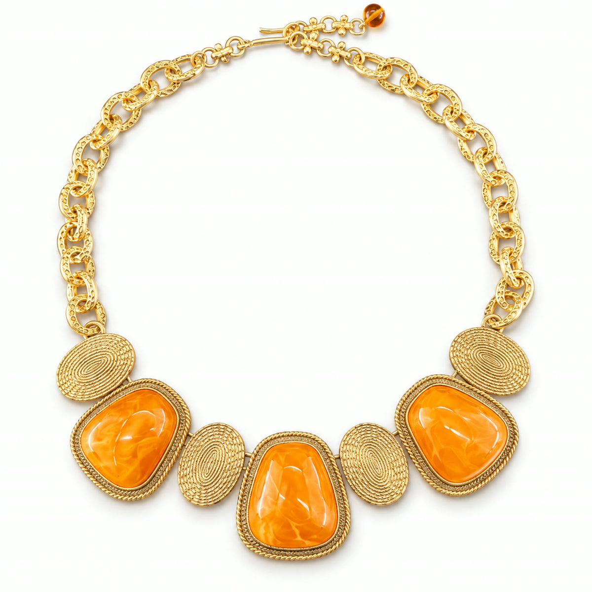 Vintage orange amber gold-plated statement necklace on a white background