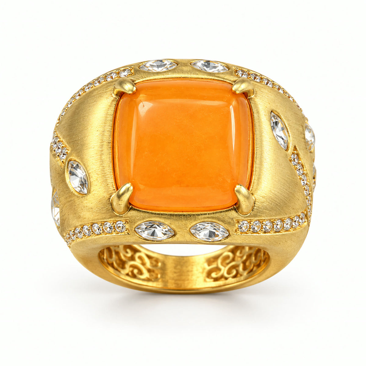 Vintage orange amber gold-plated cocktail ring on a white background