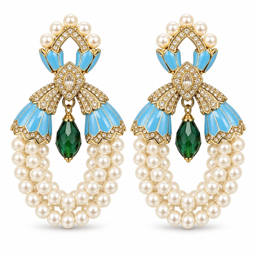 Pair of vintage blue enamel shell pearl earrings with green drops on a white background.